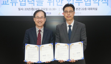 2023년 업무협약 체결(ECO융합섬유연구원-우석대 산학혁렵단).jpg